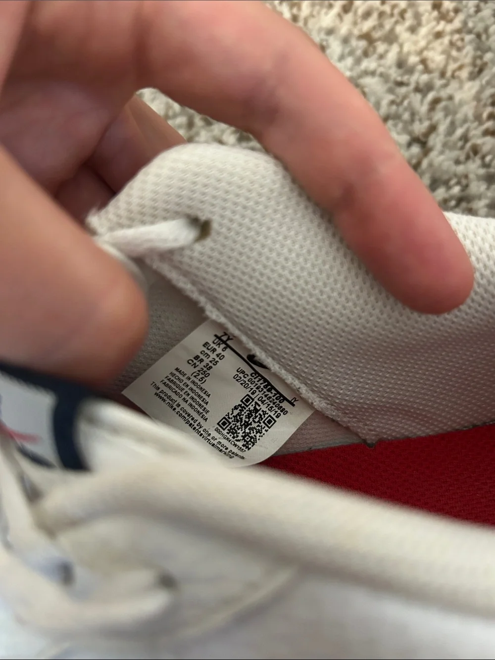 Nike Kids White Sneakers with Black Swoosh and Gum Sole
